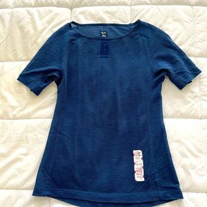 Women’s Rapha cycling merino base layer.